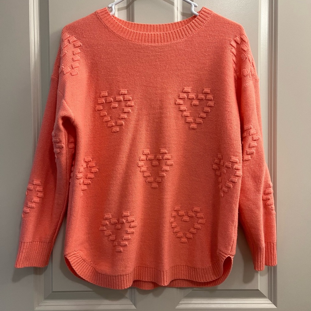 Pink sweater with heart detail